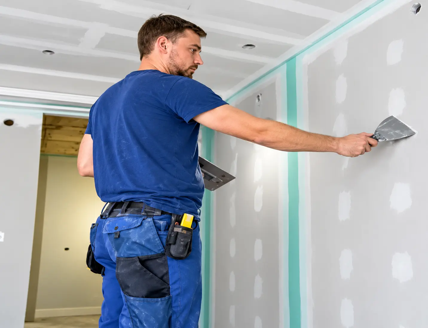 Local drywall repair professional working in Rockville